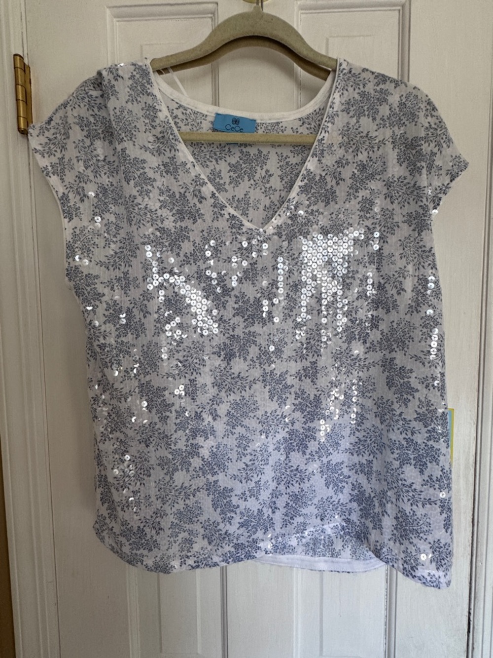 CeCe White Tee with Light Blue Floral Print and Sequins